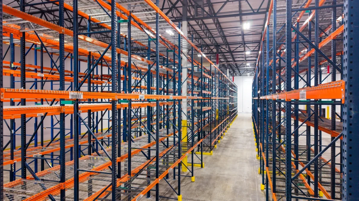 Long aisles between warehouse pallet racks